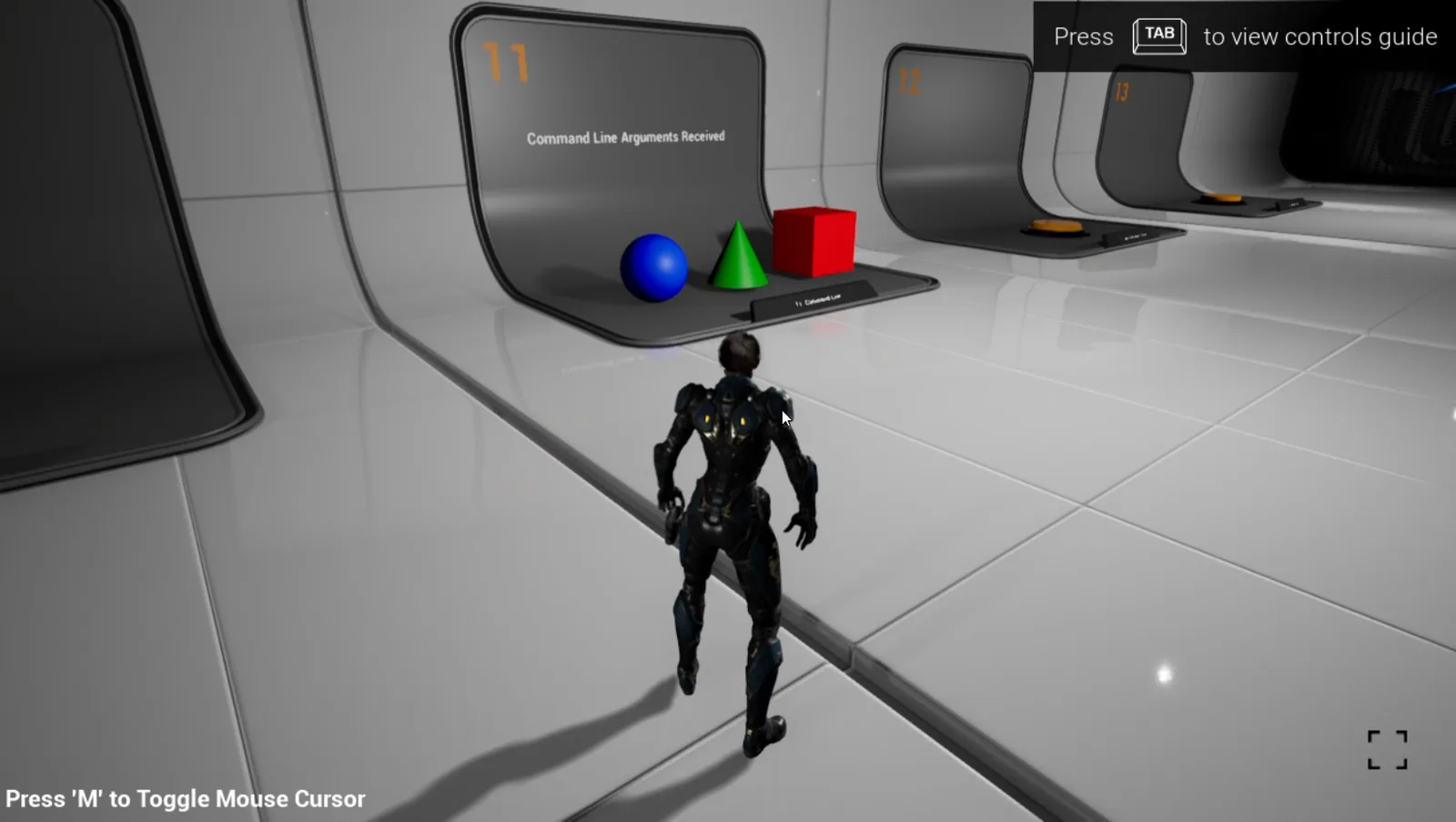 The demo at booth 11 with a blue ball, a green cone and a red box